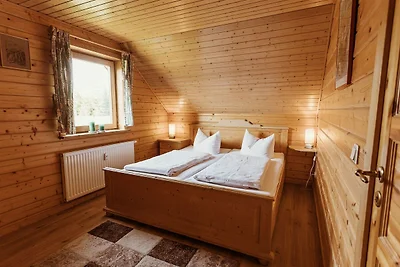 HAS-58 Holzblockhaus, 4 Pers., 65qm, HT