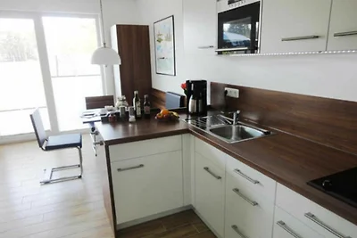 Küstenwald - Ferienwohnung Igelring H
