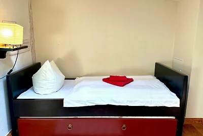 Zimmer 1 - Ferienwohnung mit Küchenbereich un...
