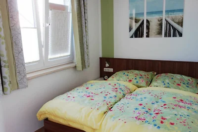 Küstenwald - Ferienwohnung Igelring H