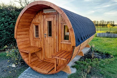 Schlafen im Fass mit Sonnenuntergang Blick