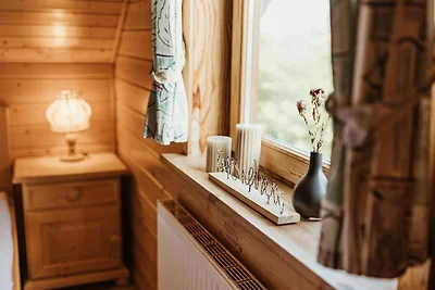 HAS-57 - Holz-Ferienhaus mit überdachter Terr...