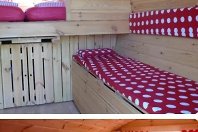 Schlafen im Fass mit Sonnenuntergang Blick