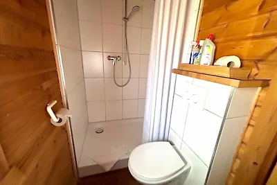LTD-48 - Holzblockhaus mit überdachter...