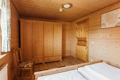 HAS-57 - Holz-Ferienhaus mit überdachter Terr...