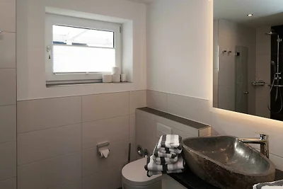 Ferienwohnung Am Wasser 4 (EG)