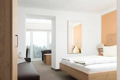 Panoramazimmer mit Wintergarten