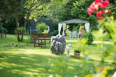 Doppelzimmer mit Balkon und Gartenblick