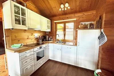 LTD-48 - Holzblockhaus mit überdachter...