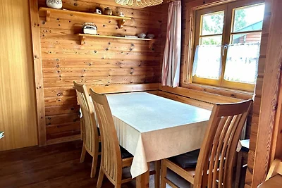 LTD-48 - Holzblockhaus mit überdachter...