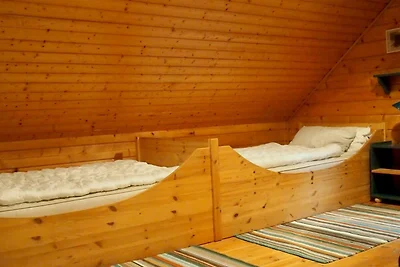HAS-50 - Holzferienhaus mit überdachter...