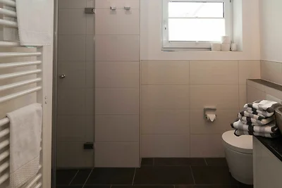 Ferienwohnung Am Wasser 4 (EG)