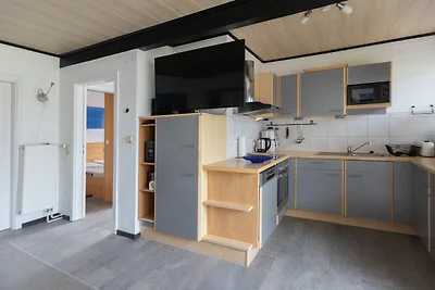 Haus hinter dem Deich