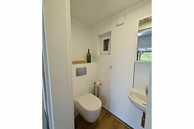 Bungalow Strandheim mit Kamin und Terrasse