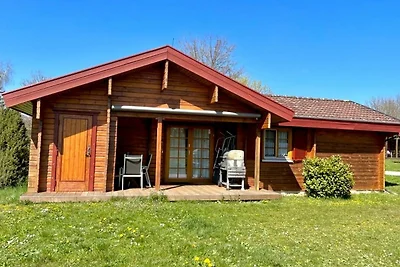 LTD-48 - Holzblockhaus mit überdachter...