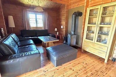 LTD-48 - Holzblockhaus mit überdachter...