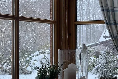 Ferienhaus mit Kachelofen und Garten am Reich...