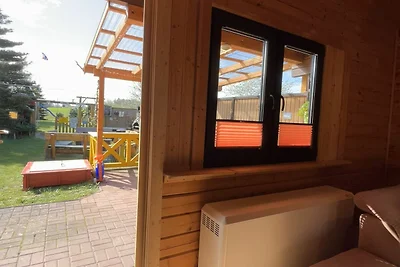 3-Raum-Holzhaus mit Gartenterrasse (70m², max...