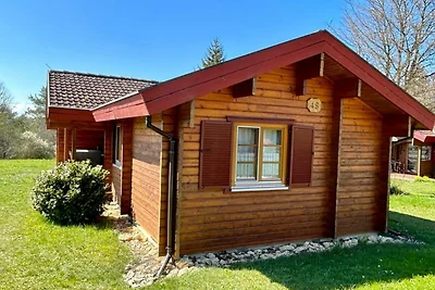 LTD-48 - Holzblockhaus mit überdachter...