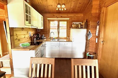LTD-48 - Holzblockhaus mit überdachter...