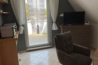 Appartement mit Balkon im Obergeschoss