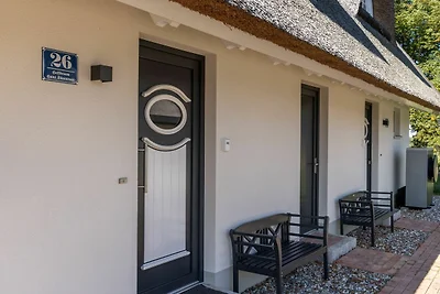 Reet-Haus XL mit 4 Schlafzimmern, Kamin und...