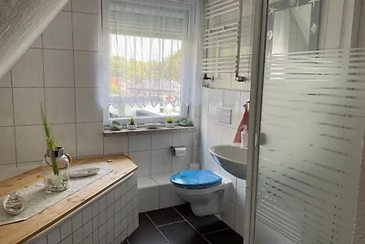 Appartement mit Balkon im Obergeschoss