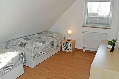 Ferienwohnung Rapsblüte mit Kamin und Balkon