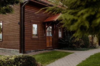 HAS-57 - Holz-Ferienhaus mit überdachter Terr...