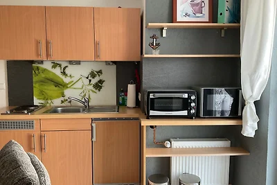 Appartement mit Balkon im Obergeschoss