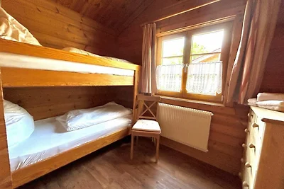 LTD-48 - Holzblockhaus mit überdachter...