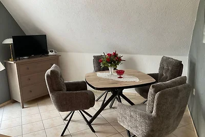 Appartement mit Balkon im Obergeschoss