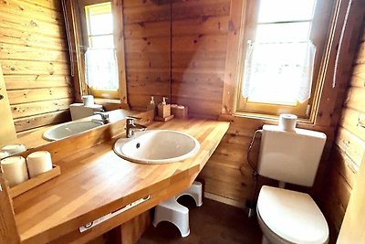 LTD-48 - Holzblockhaus mit überdachter...