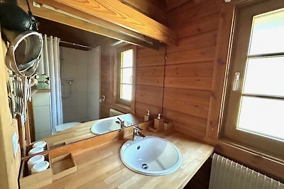 LTD-48 - Holzblockhaus mit überdachter...