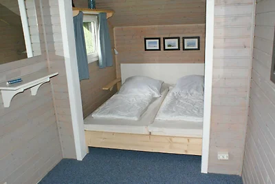 Blockhaus mit Zaun