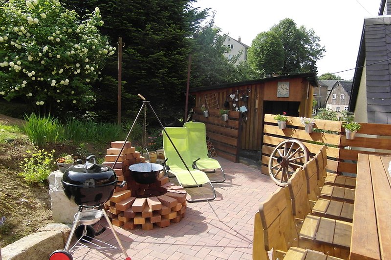 Seating area with fire pit and grill