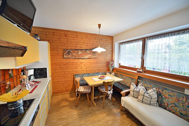 Apartments Dolomie - Wohnraum und Küche