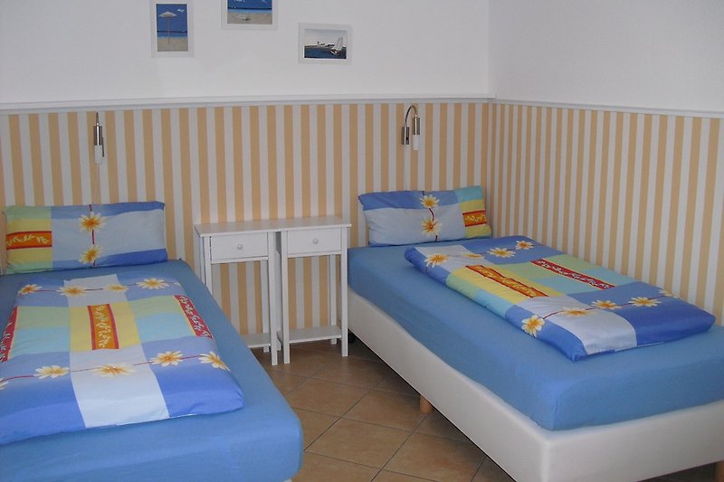2. Dormitorio con camas box spring súper cómodas