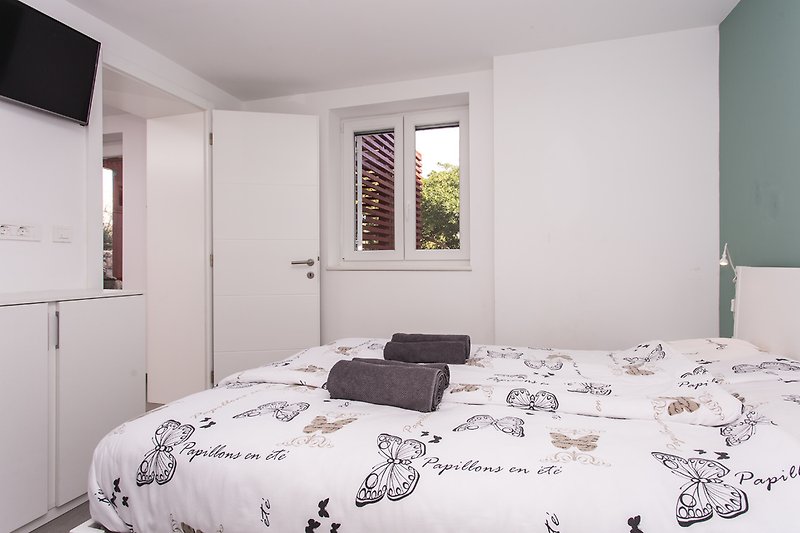 Apartment Karla****_ smaller double bedroom (bed 140*200). Smart SAT TV also in each bedroom