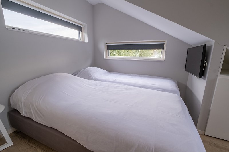 VL22-Schlafzimmer mit Doppelbetten