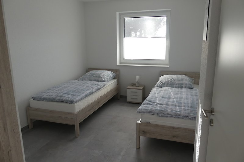 Schlafzimmer 2 mit Einzelbetten