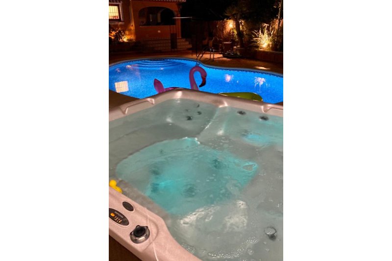 pool + whirlpool at night