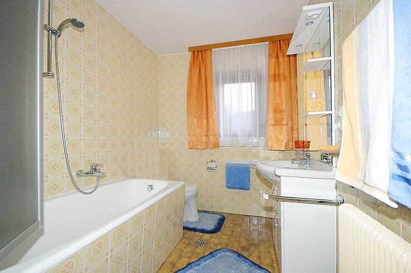 Bathroom with shower screen and toilet.