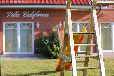 Villa California - Kaminwohnung 1