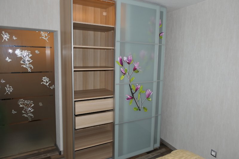 Bedroom with large wardrobe