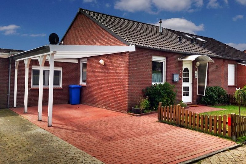 FerienhausNordseekrabbe Ferienhaus in Hage mieten