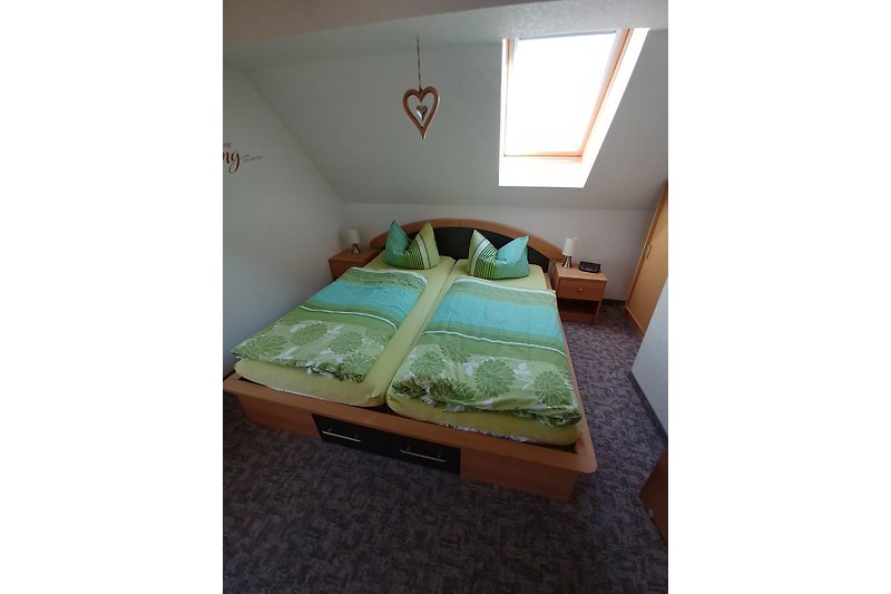 Schlafzimmer 3 mit einem Doppelbett