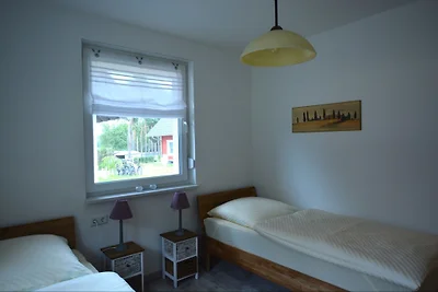 Haus Odin mit Boot und Steg, MV