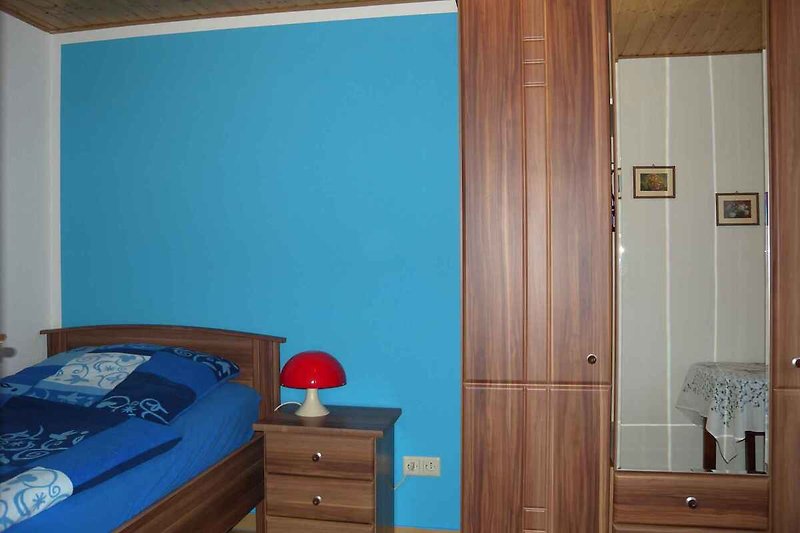 Slaapkamer met éénpersoonsbed