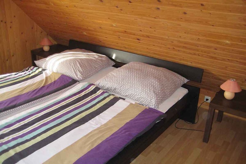 Slaapkamer met 3 éénpersoonsbedden